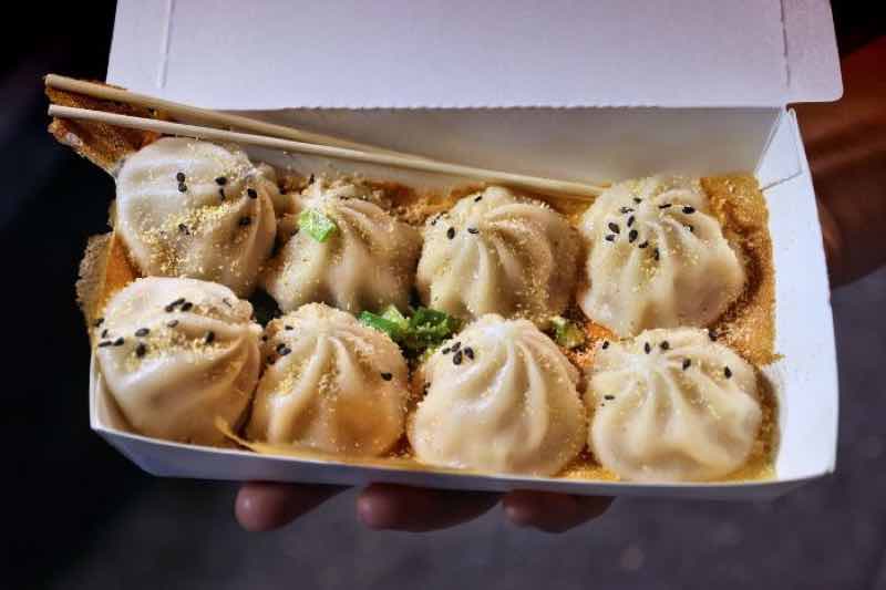 dumplings to go during Chinatown food tour SF